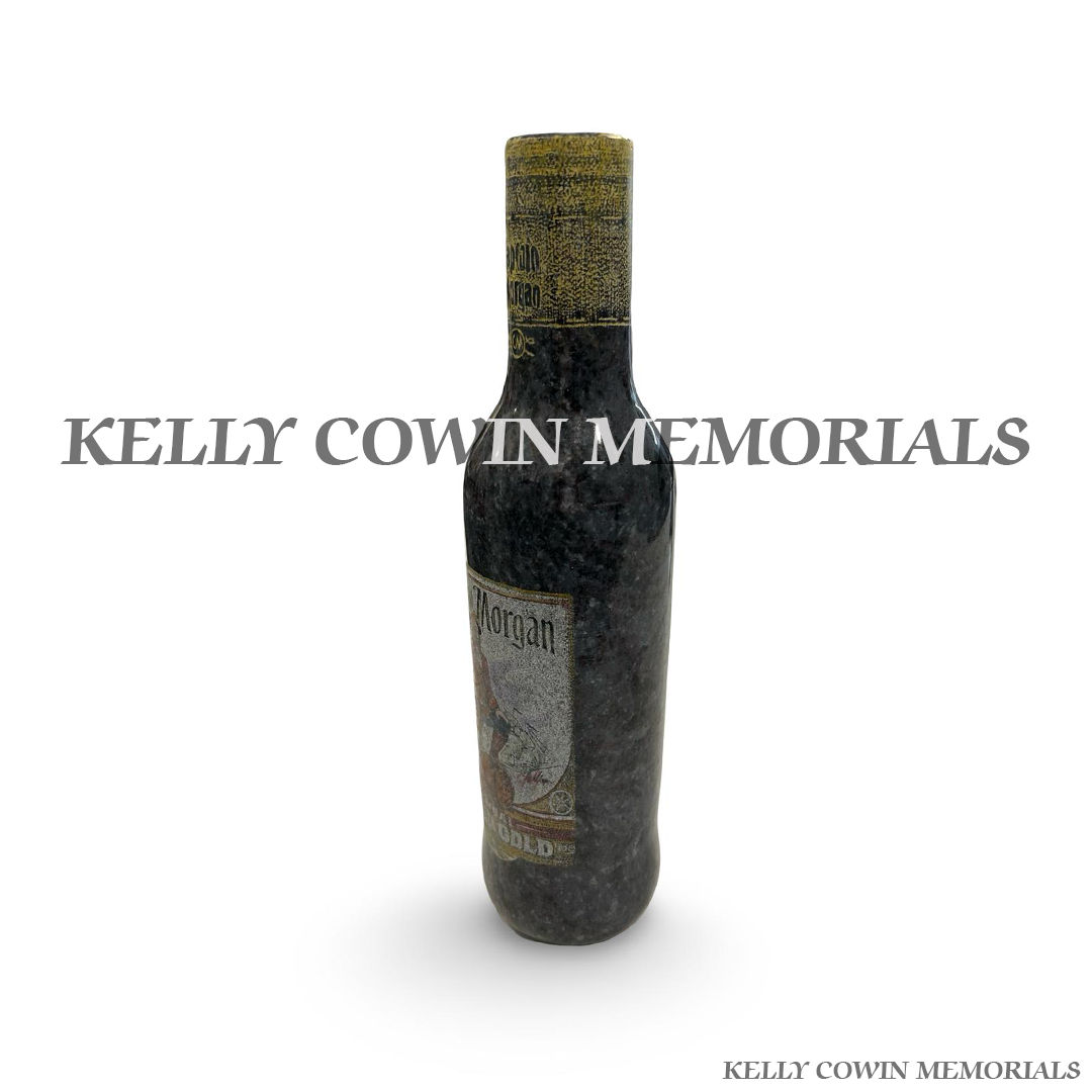 Side view of polished Blue Lagoon granite bottle ornament with laser engraving