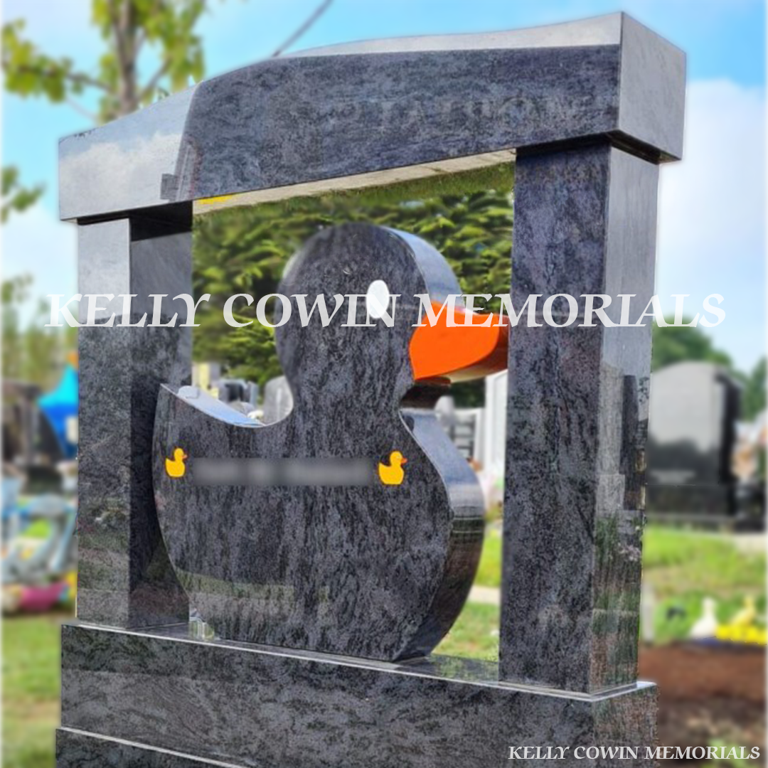 Back view of custom Blue Lagoon duck headstone highlighting Dublin headstone craftsmanship by Kelly Cowin Memorials