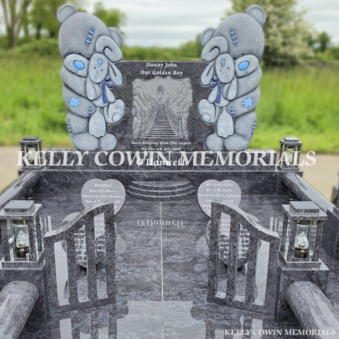 Memorial with teddy bear sculptures and text 'Kelly Cowin Memorials'.