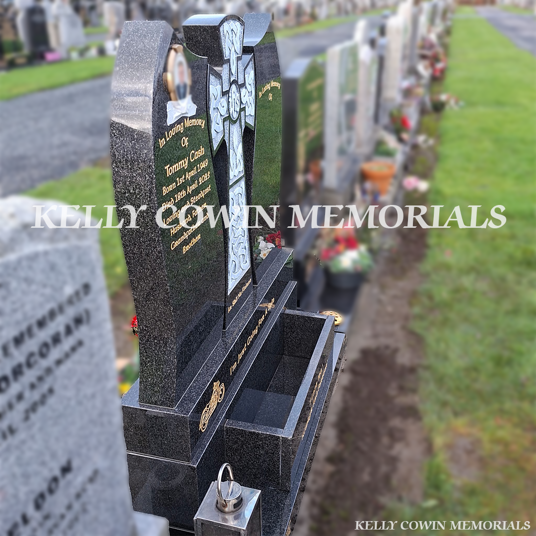 Side view of Rustenburg Celtic Cross headstone showing stepped base and flower box in Dardistown Cemetery