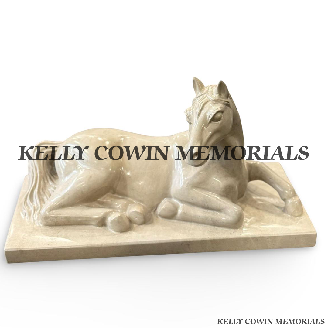 Main image: Custom-made Haley Beige granite horse memorial ornament on matching granite plinth by Kelly Cowin Memorials.