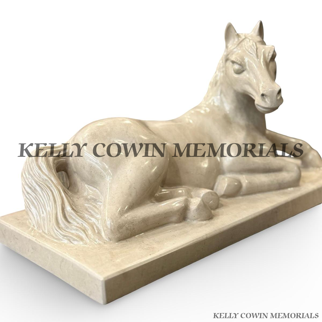 Custom-made Haley Beige granite horse memorial ornament on matching granite plinth by Kelly Cowin Memorials.