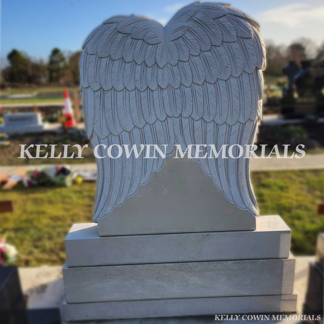 Rear view of Haley Beige angel headstone on plinth in Balgriffin Cemetery Dublin