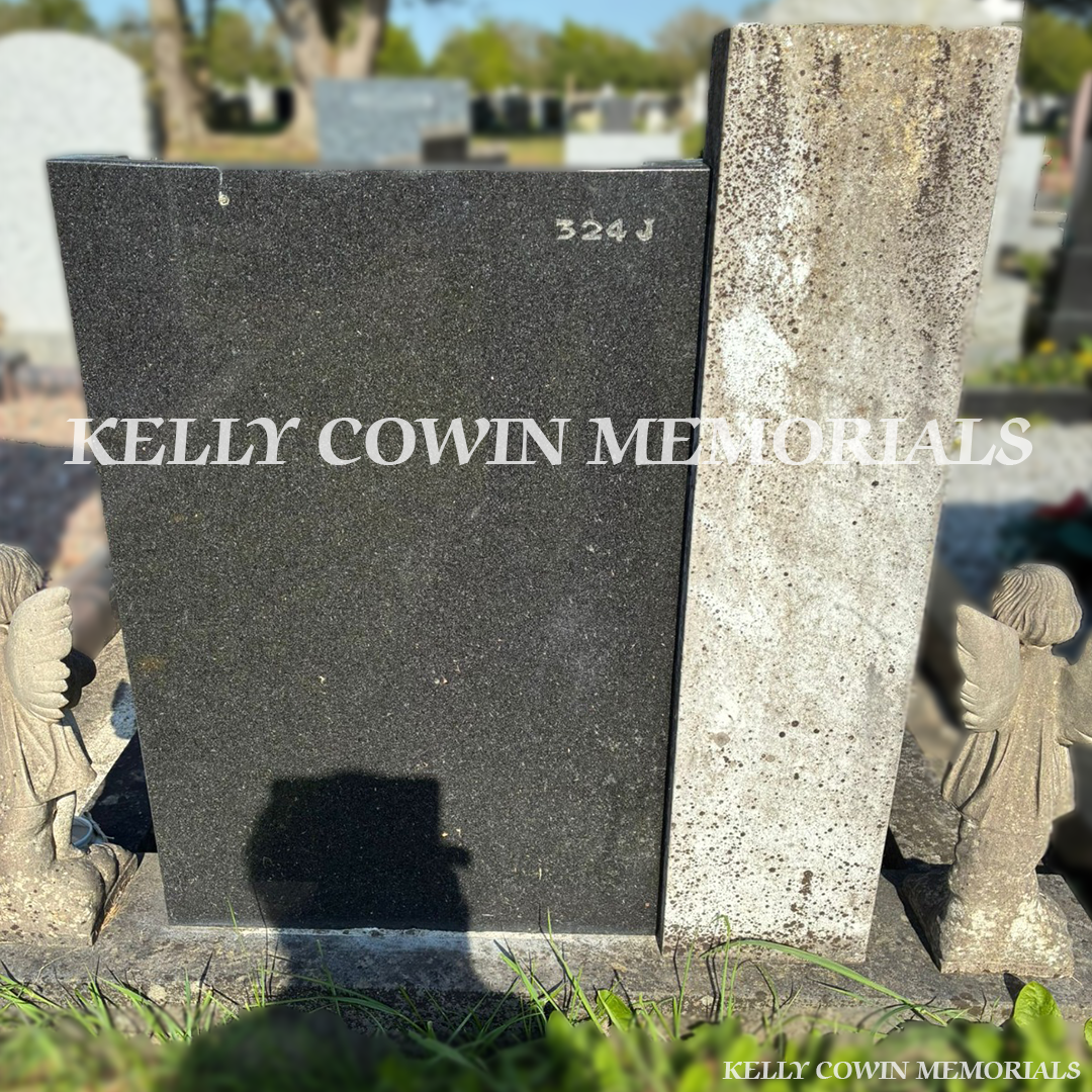 Before renovation of black granite and limestone memorial in Esker Cemetery