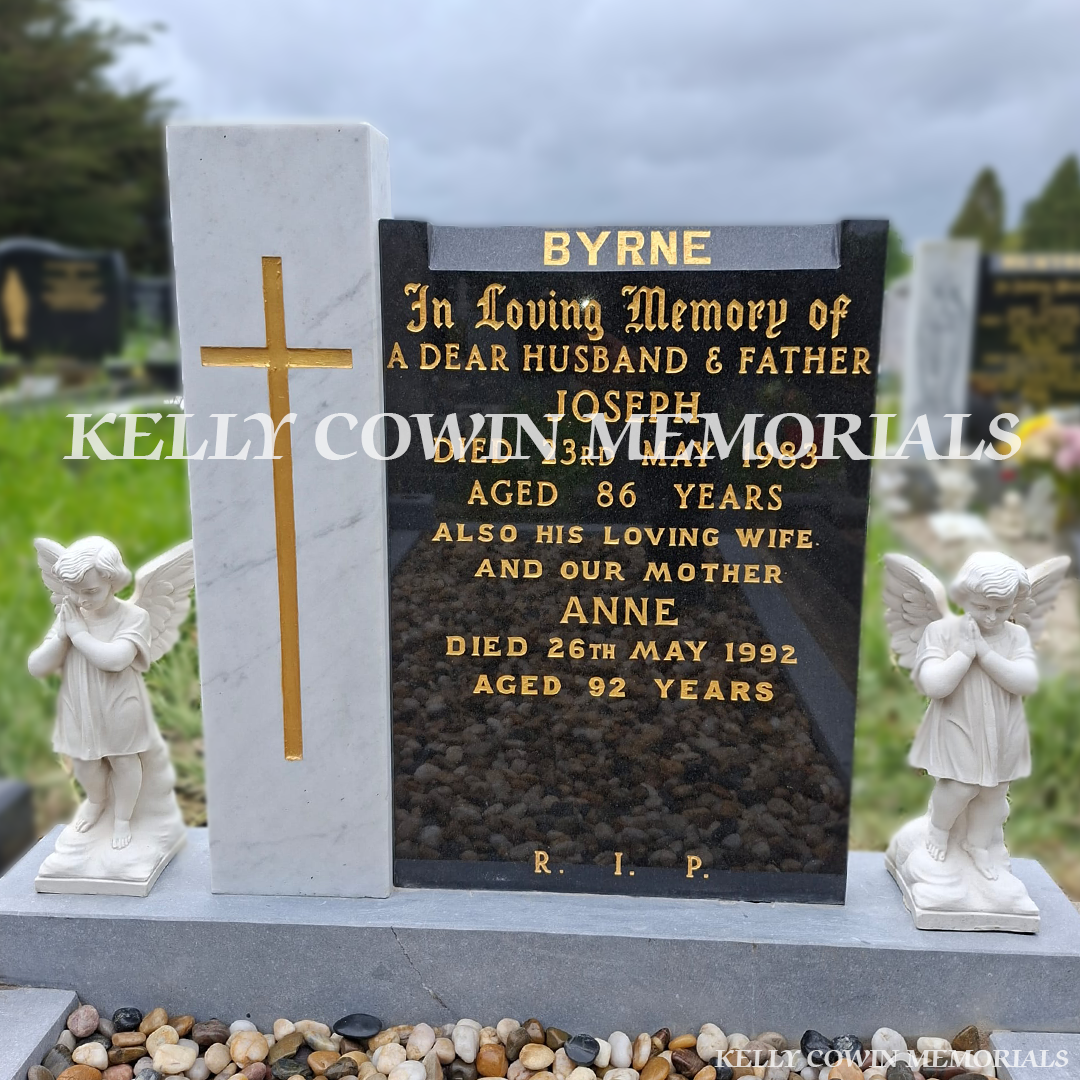 After renovation of restored marble angels and limestone kerbing in Esker Cemetery