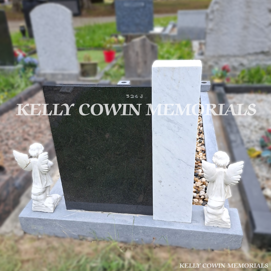 After renovation of restored marble angels and limestone kerbing in Esker Cemetery