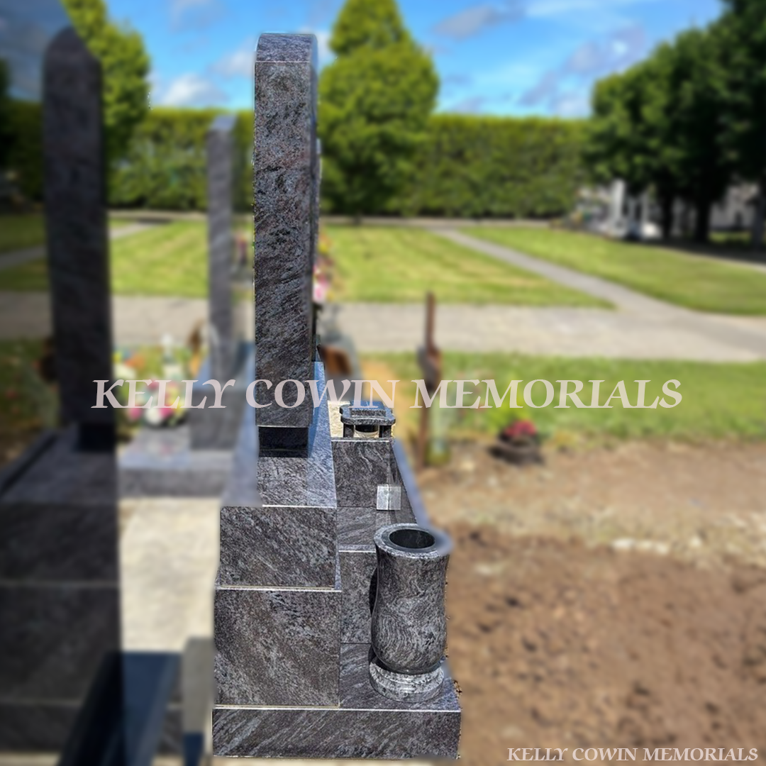 Blue Lagoon C1 granite memorial headstone with silver lettering, base, sub base and plinth installed in Flemington Cemetery by Kelly Cowin Memorials