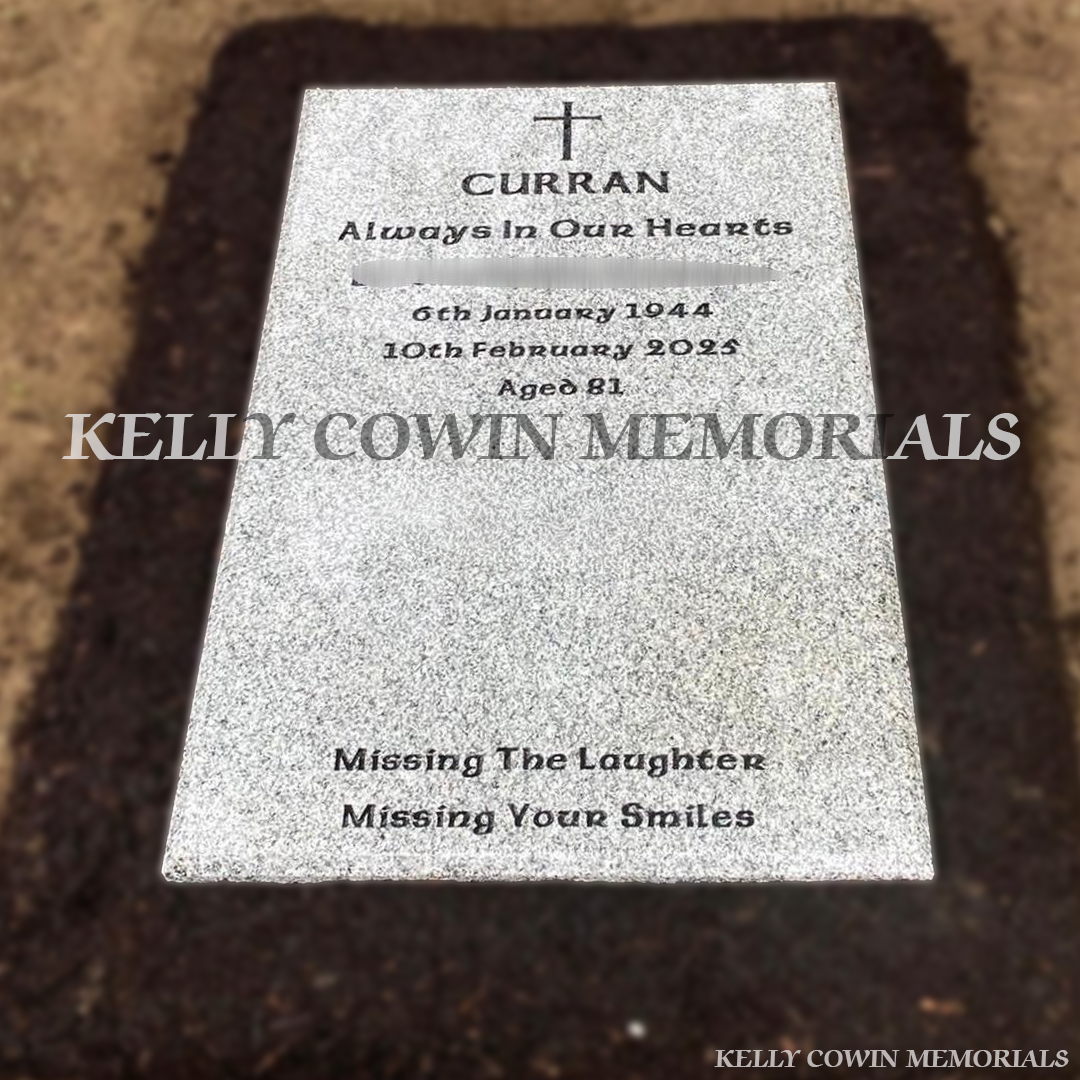 Grey granite headstone with black inscription installed in St. Fintan’s Cemetery Sutton by Kelly Cowin Memorials Dublin