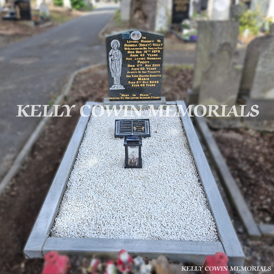 After renovation of restored limestone kerbing and granite memorial in Glasnevin Cemetery
