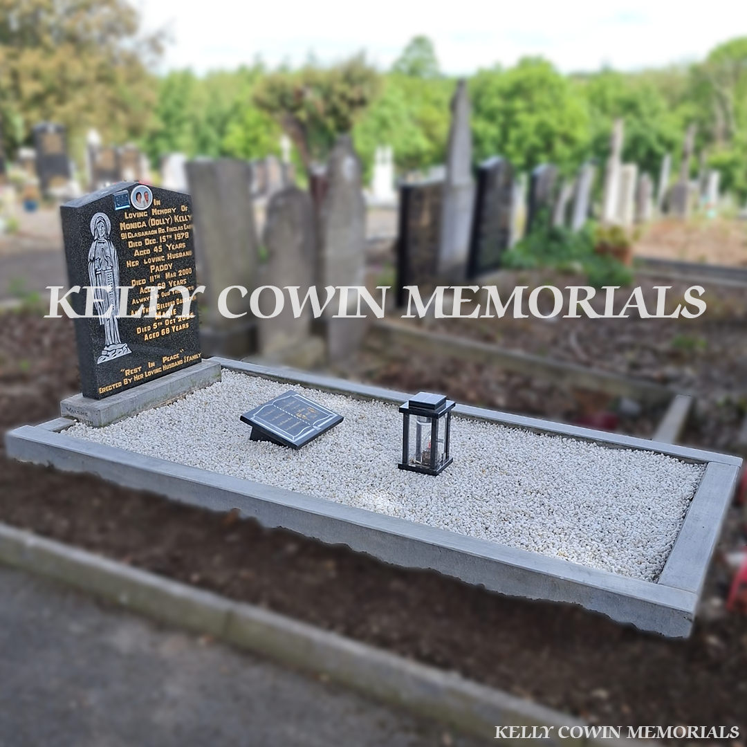 After renovation of restored limestone kerbing and granite memorial in Glasnevin Cemetery