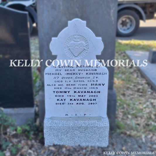 After renovation of restored white marble memorial and limestone base