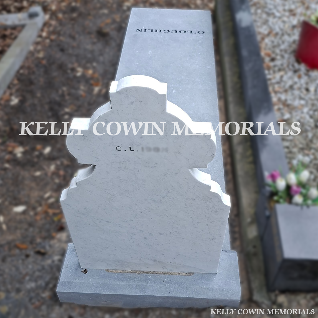 After renovation of restored white marble headstone and limestone grave surround