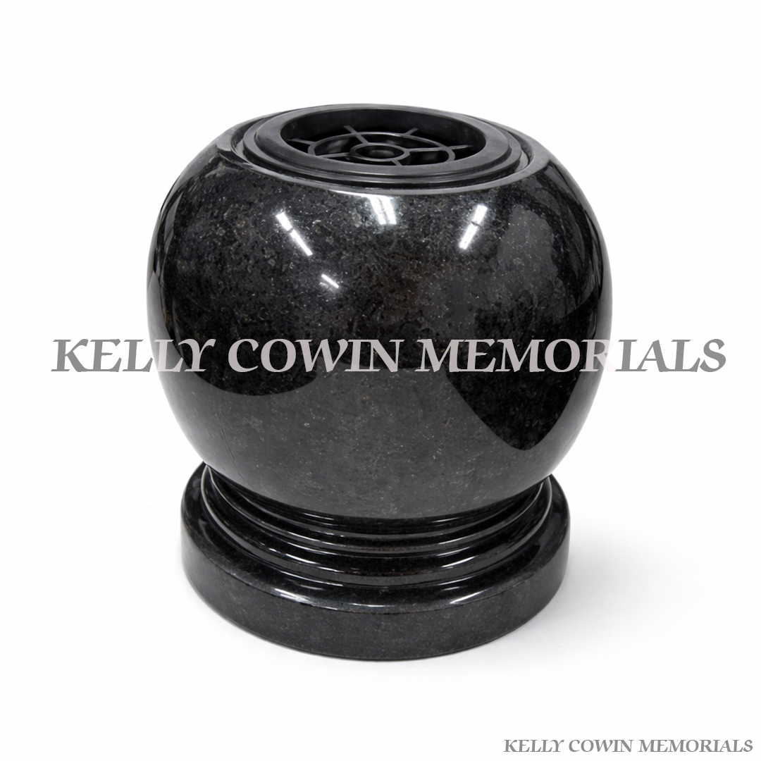 Black granite tall urn-shaped memorial vase for grave flowers supplied by Kelly Cowin Memorials Ireland