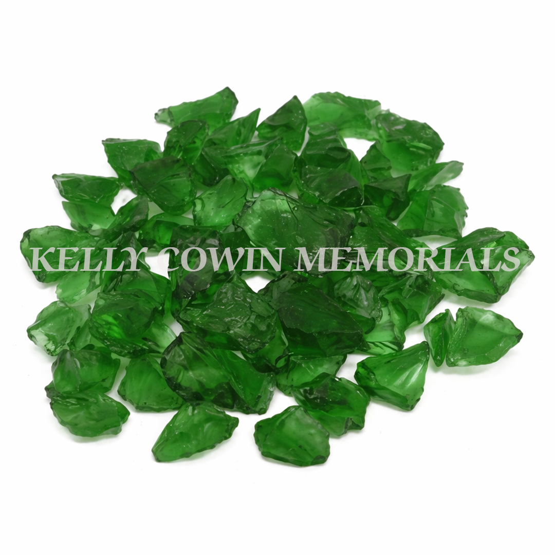 Green decorative glass chippings on grave plot supplied in Dublin by Kelly Cowin Memorials with nationwide delivery across Ireland.