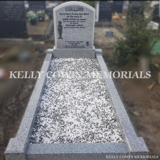 Grey granite polished boulder headstone erected in Fingal Cemetery Dublin by Kelly Cowin Memorials