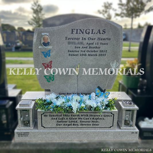 Grey granite C1 children’s headstone with photo, lanterns and butterfly engravings in Balgriffin Cemetery Dublin
