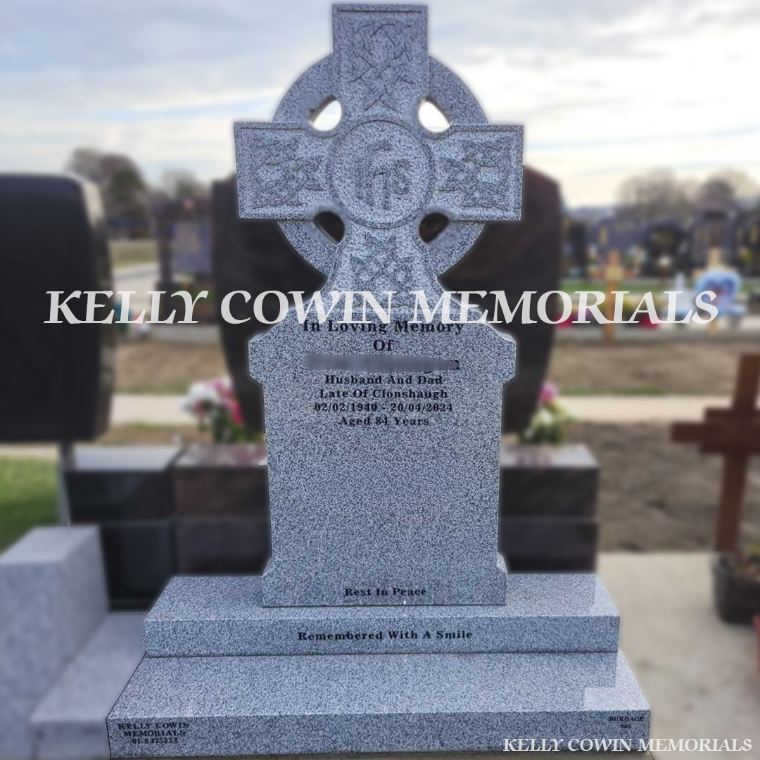 Front view of Grey Granite Celtic Cross headstone with black inscription on base and plinth in Balgriffin Cemetery Dublin