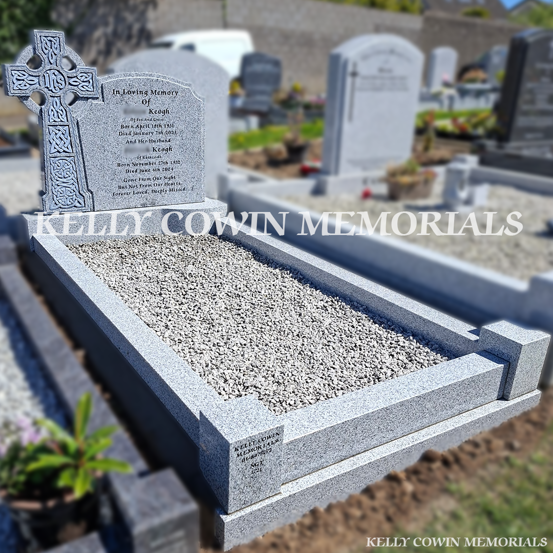 Side view of grey granite memorial with kerbing and granite chippings