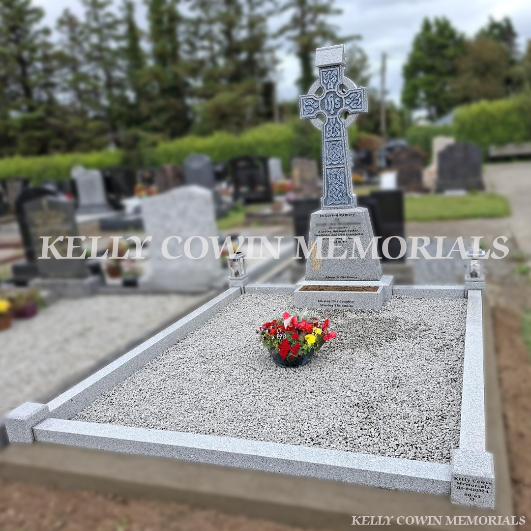 Grey granite Celtic cross headstone with kerbing and chippings installed at Whitestown Cemetery Rush by Kelly Cowin Memorials
