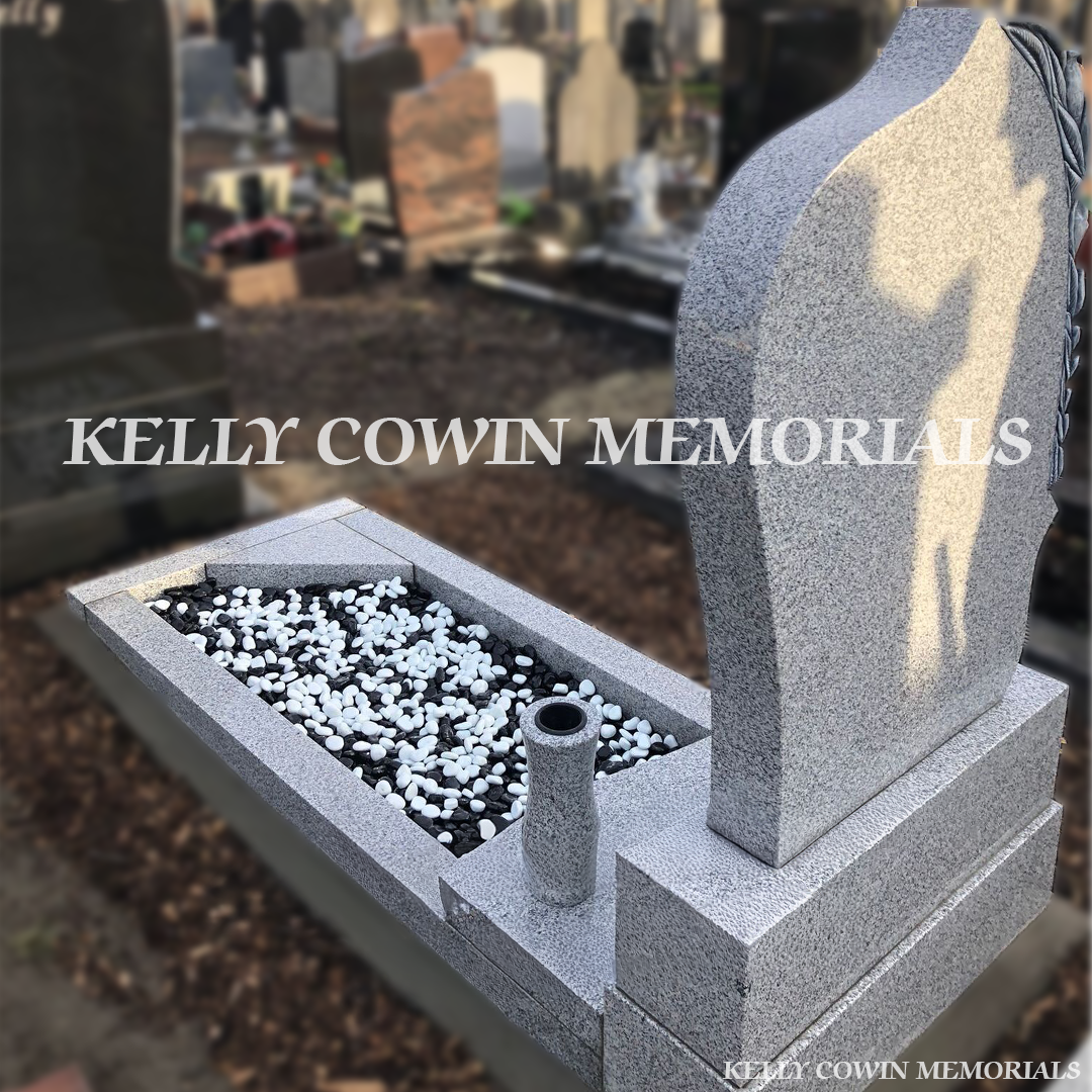 Back view of Antique Rose Grey Granite headstone highlighting craftsmanship by Kelly Cowin Memorials