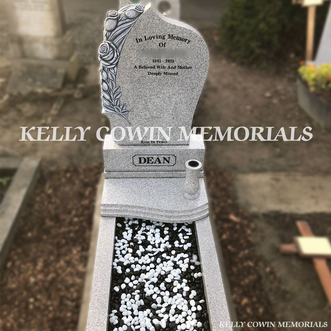 Front view of Antique Rose carved Grey Granite headstone with kerbing and chippings erected in Glasnevin Cemetery by Kelly Cowin Memorials