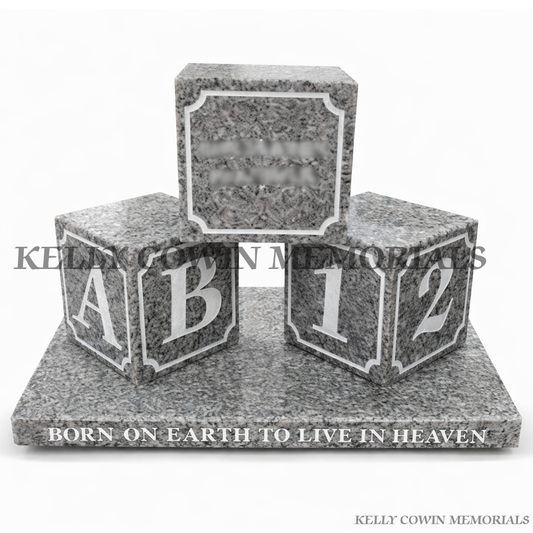 Grey granite baby blocks grave accessory with engraved lettering on memorial base by Kelly Cowin Memorials Dublin Ireland