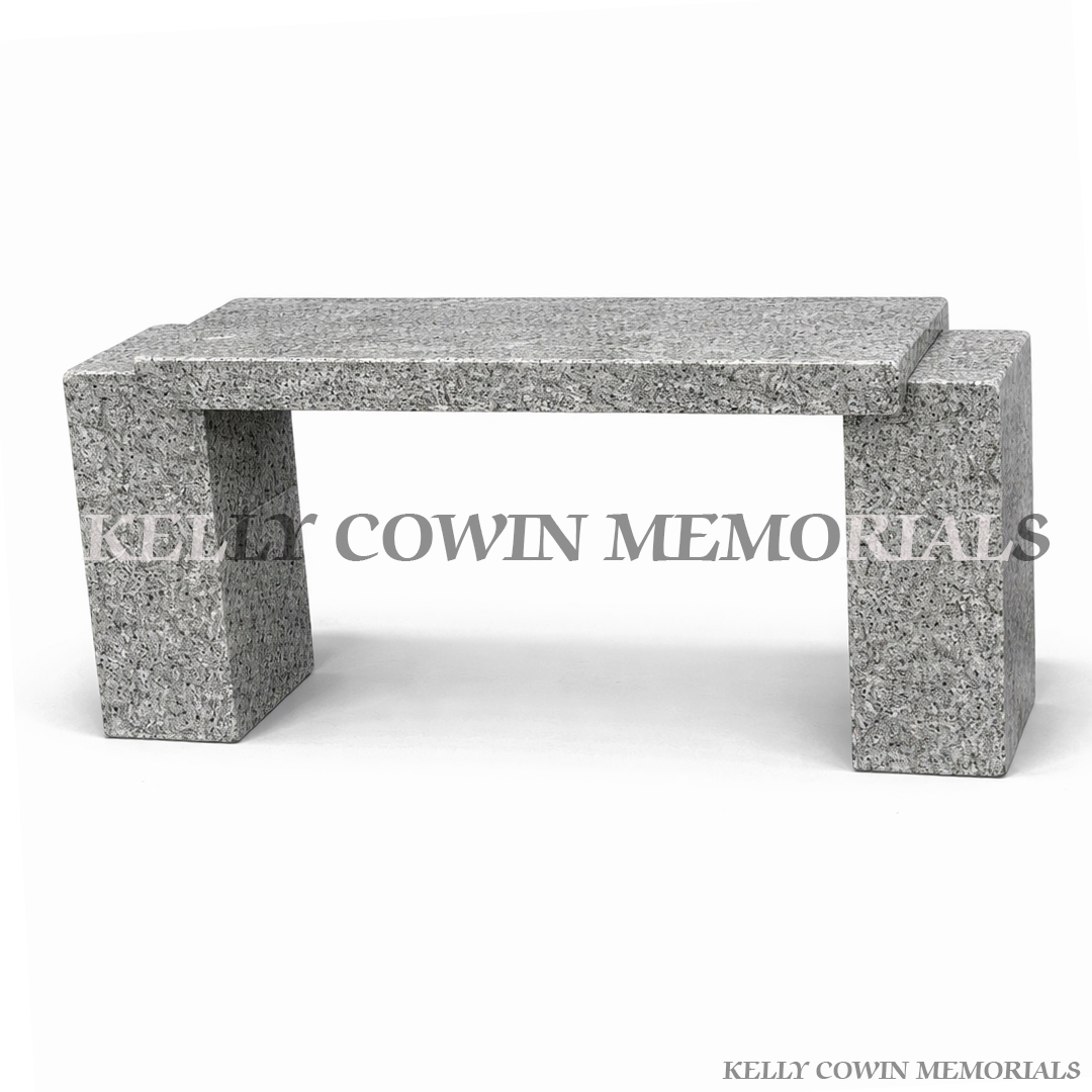 Grey granite graveside memorial bench seat with polished finish by Kelly Cowin Memorials Ireland on white background with soft shadow