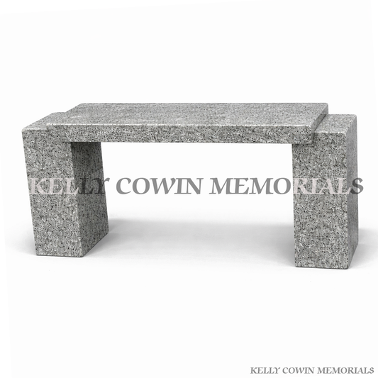 Grey granite graveside memorial bench seat with polished finish by Kelly Cowin Memorials Ireland on white background with soft shadow