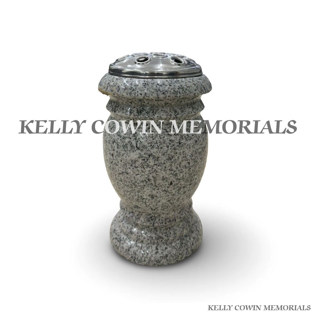 Front view of grey granite urn shaped vase with silver lid