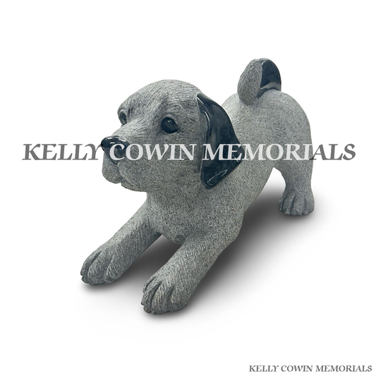 Side view of rough grey granite dog memorial ornament