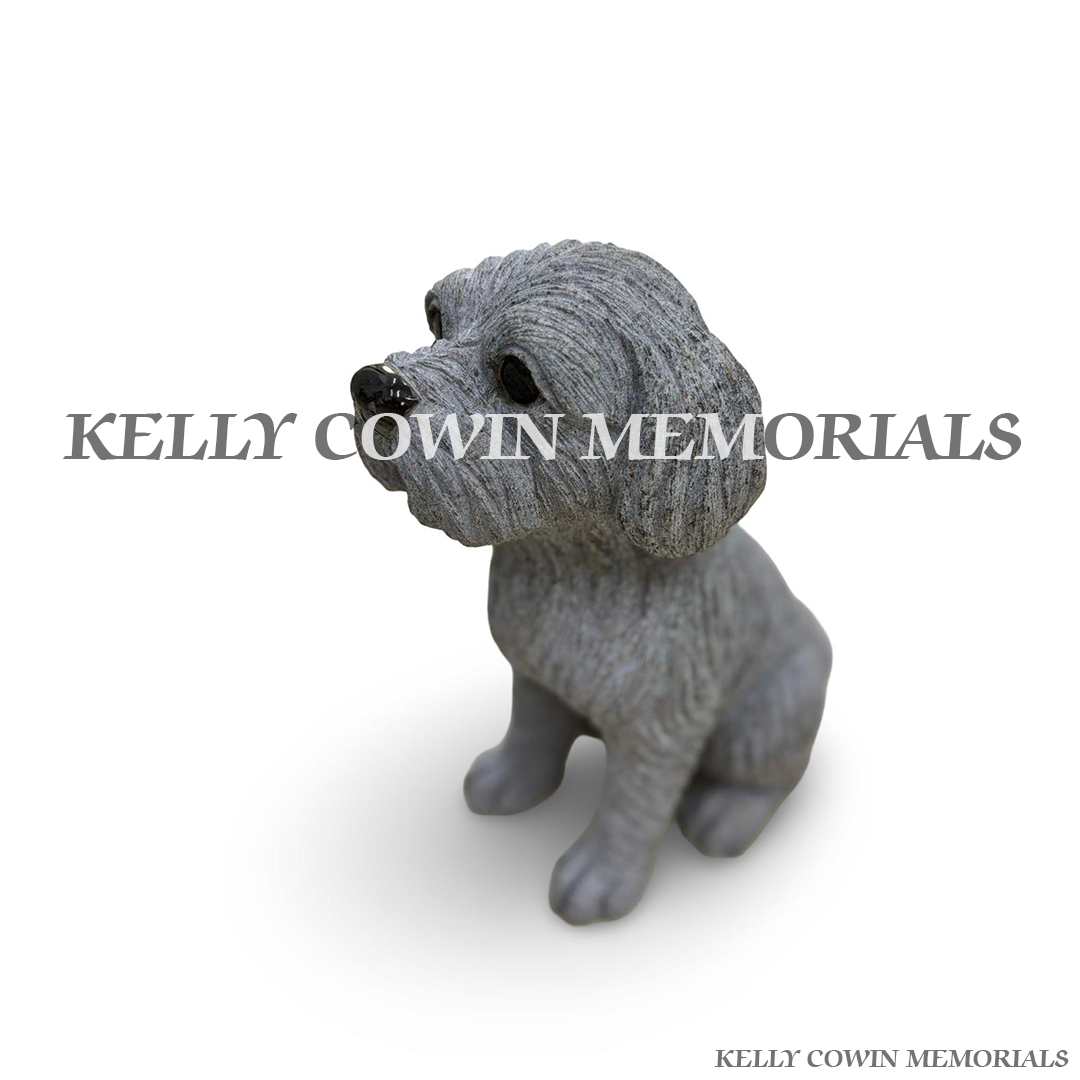 Side view of rough grey granite dog memorial ornament