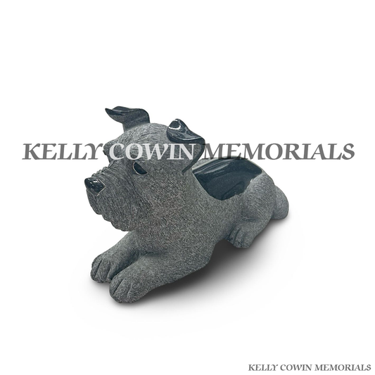 Side view of rough grey granite dog memorial ornament