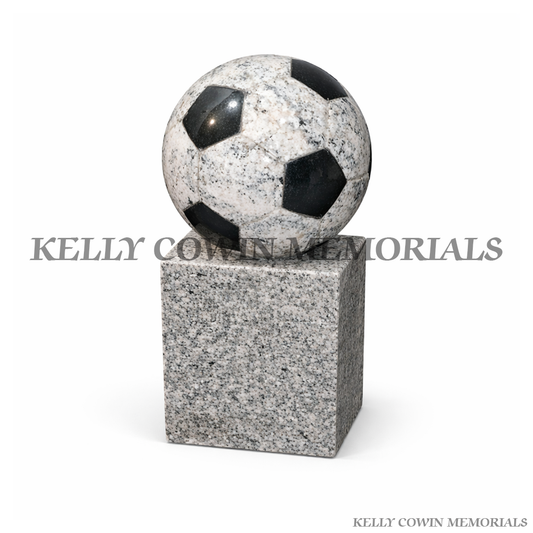 Football grave accessory on grey granite block with polished finish, handcrafted in Ireland, available locally and nationwide