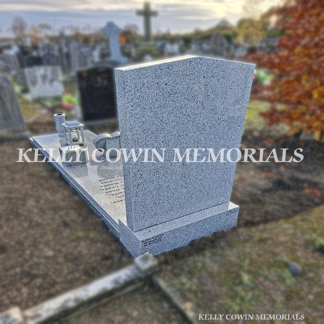 Back view of grey granite apex headstone with polished rear panel and full granite slab in Glasnevin Cemetery.