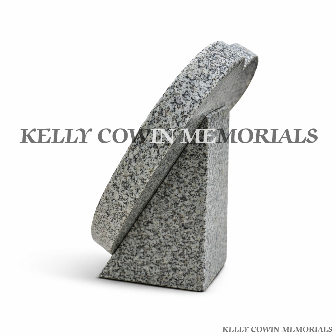 Side view of grey granite heart memorial plaque with polished finish