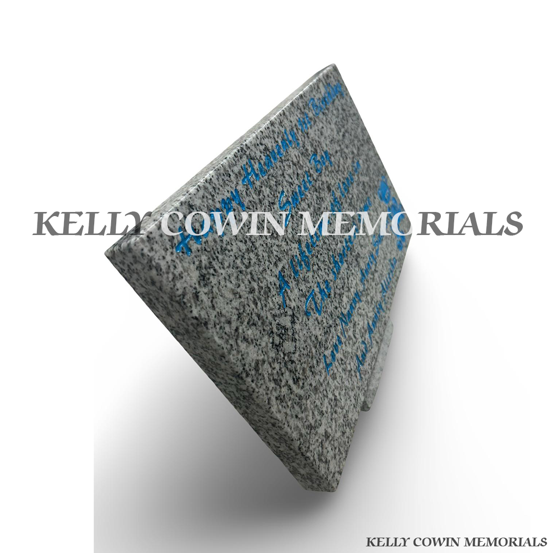 Side view of polished grey granite rectangular memorial plaque