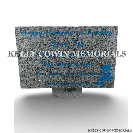 Front view of grey granite memorial plaque with teddy bear and baby block engraving