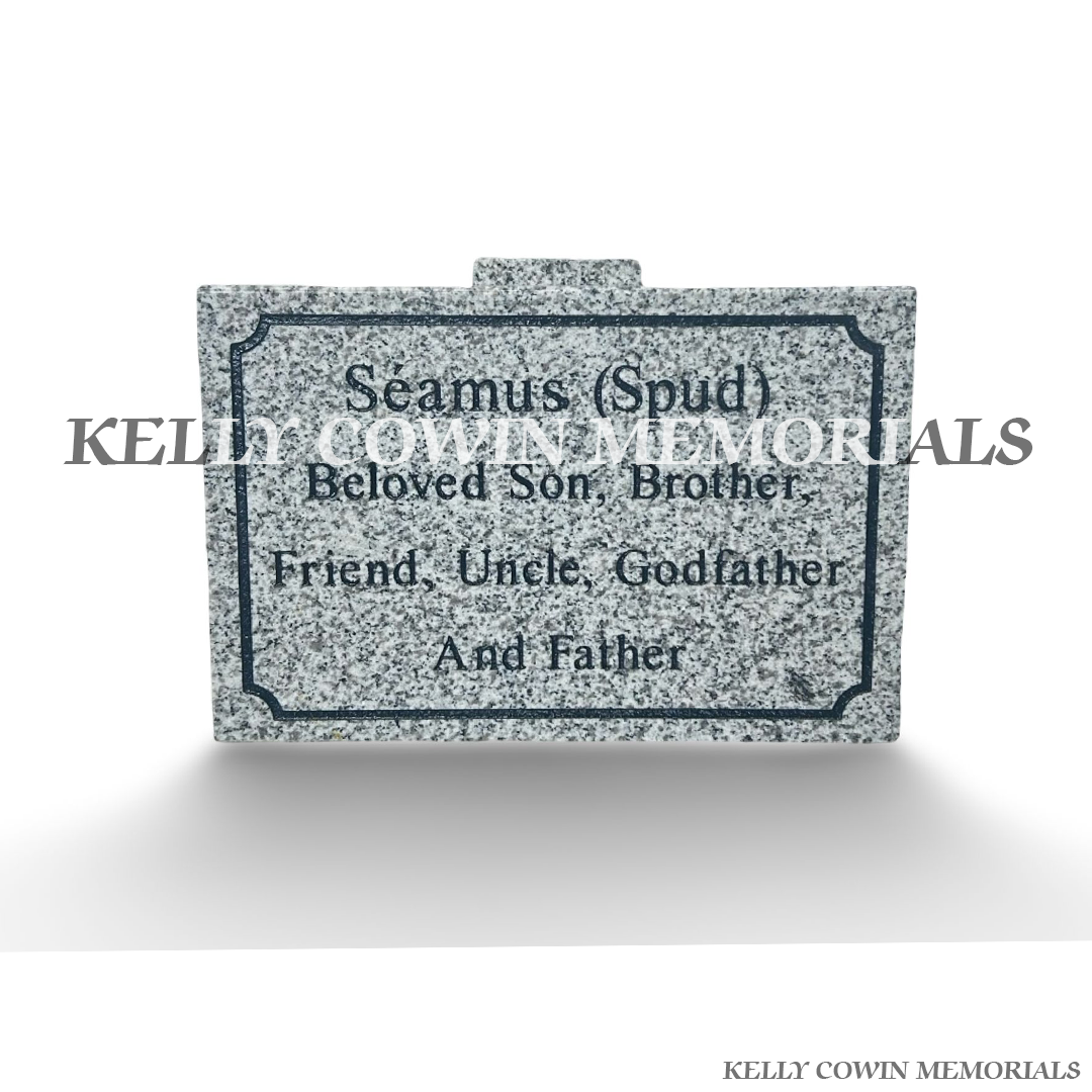 Front view of grey granite memorial plaque with black engraved wording