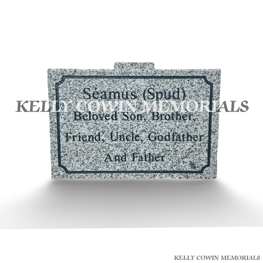 Front view of grey granite memorial plaque with black engraved wording
