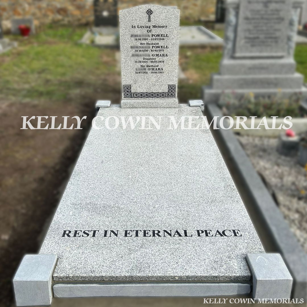 Front view of grey granite OG headstone with black inscription in Kilbarrack Cemetery Dublin