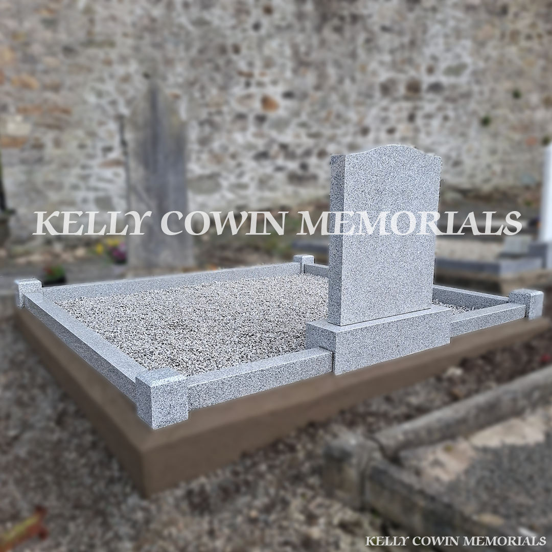 Rear view of grey granite OG headstone with granite chippings