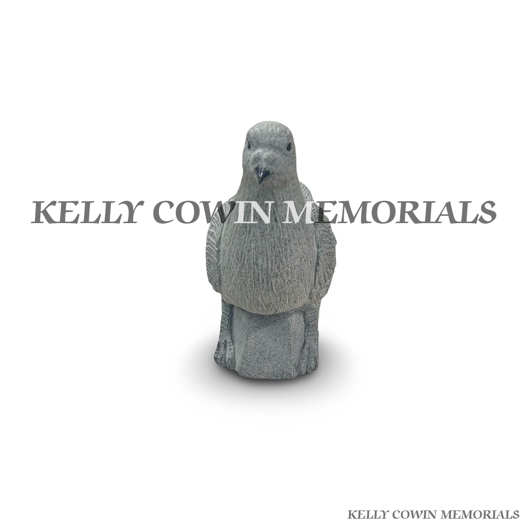 Front view of hand-carved grey granite pigeon memorial accessory