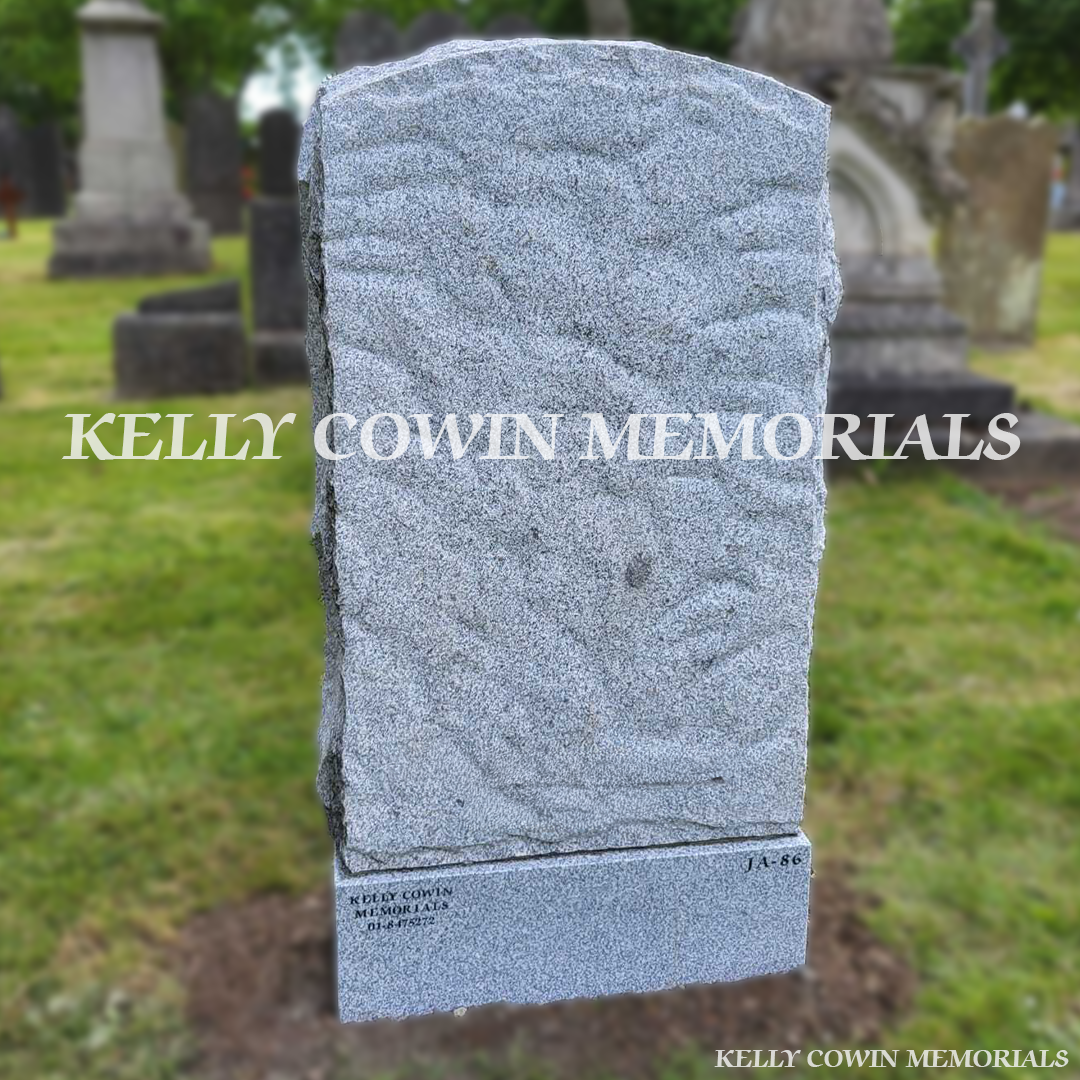 Back view of Grey Granite rough edge boulder headstone highlighting Dublin headstone craftsmanship by Kelly Cowin Memorials
