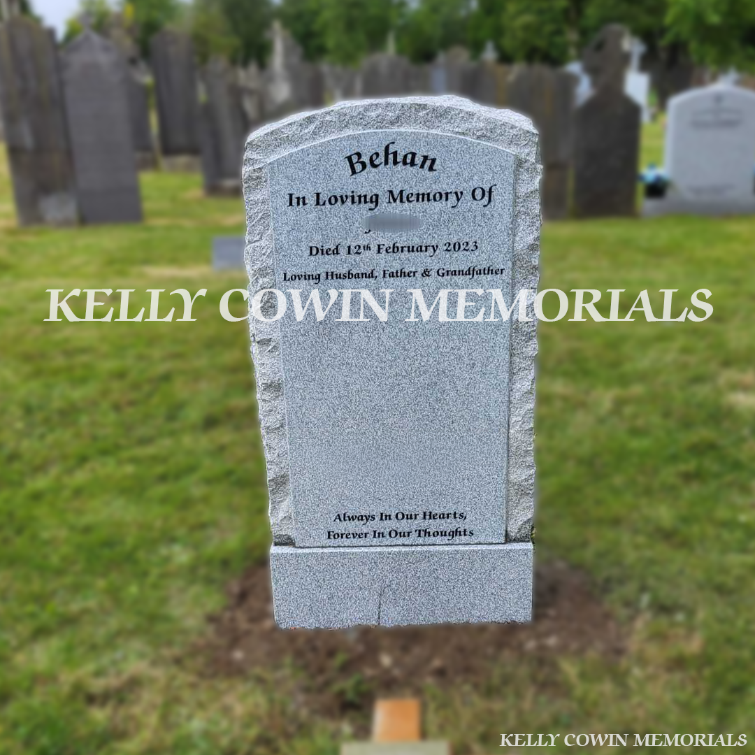 Front view of Grey Granite rough edge boulder headstone erected in Glasnevin Cemetery Dublin by Kelly Cowin Memorials