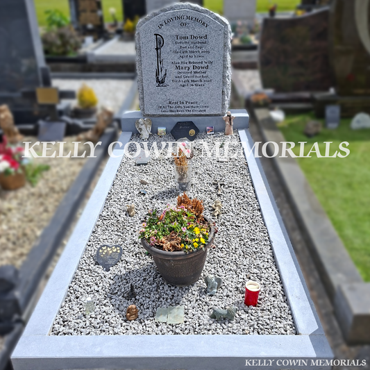 After renovation of restored granite boulder headstone and kerbing in Newcastle Cemetery