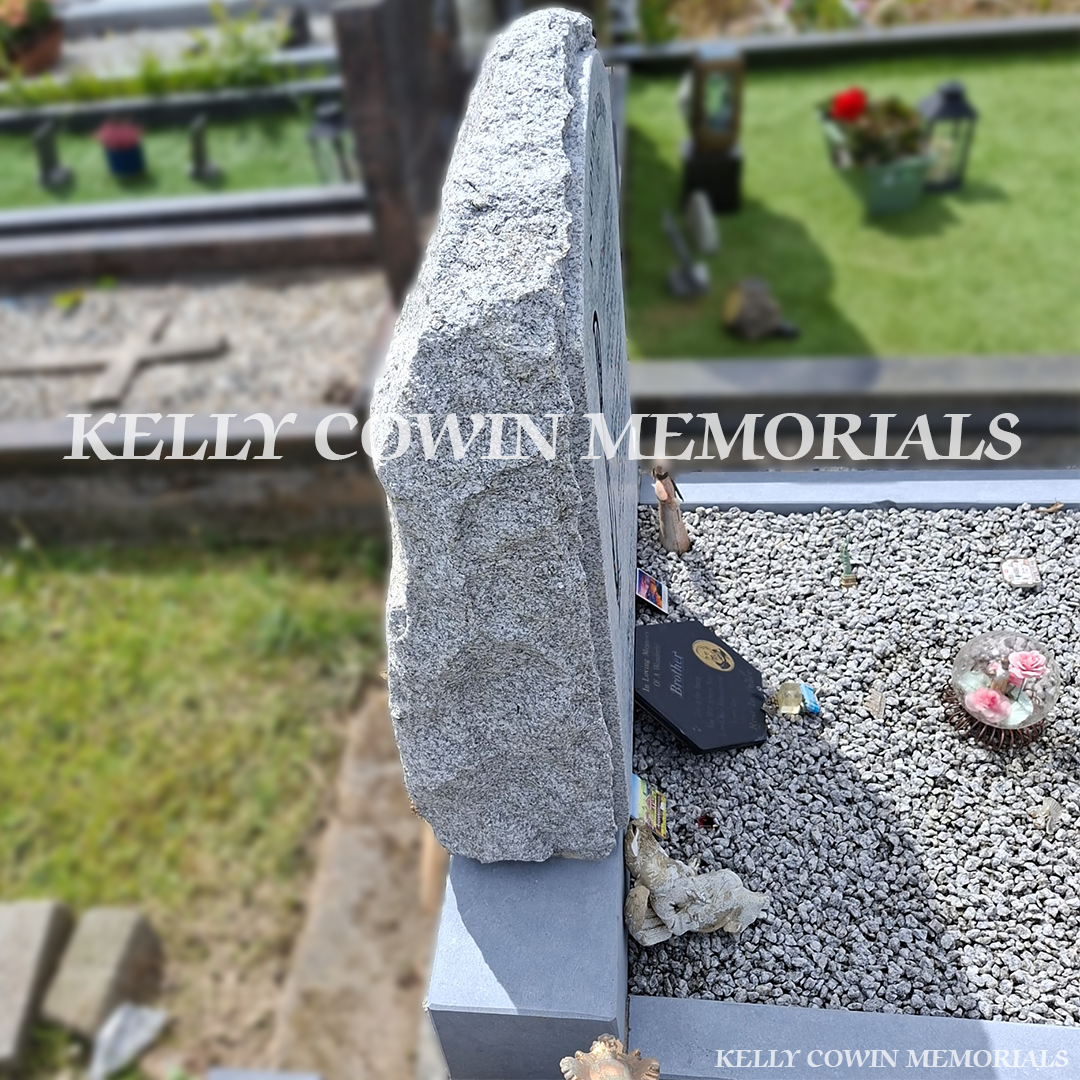 After renovation of restored granite boulder headstone and kerbing in Newcastle Cemetery