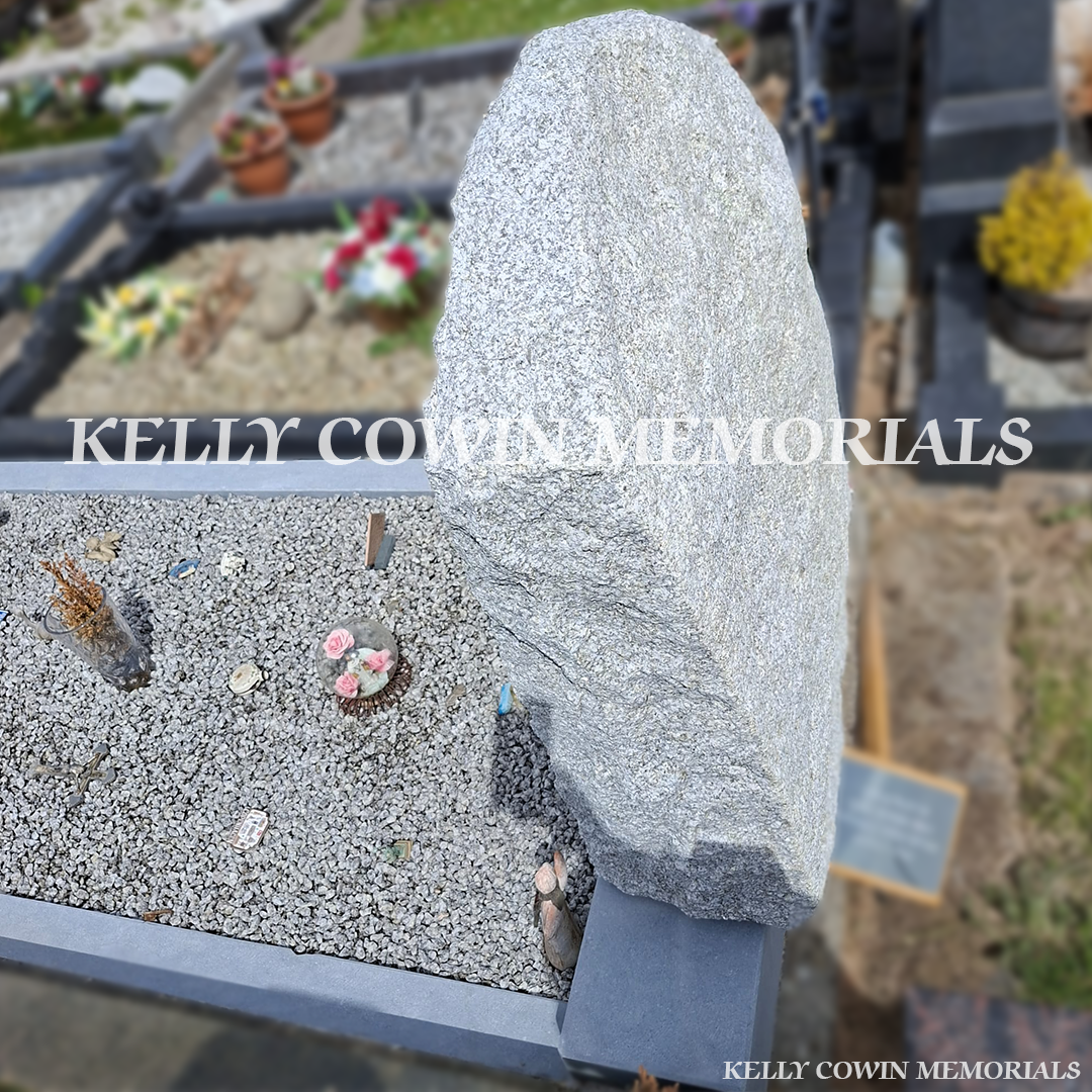 After renovation of restored granite boulder headstone and kerbing in Newcastle Cemetery
