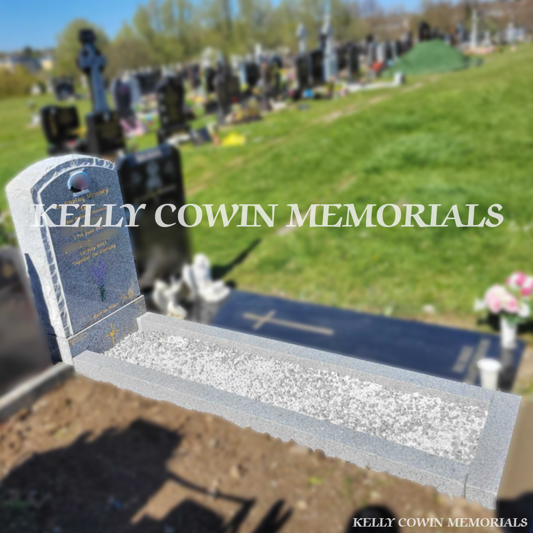 Side view of Grey Granite boulder memorial showing rough edges, kerbing and ceramic photograph in Glasnevin Cemetery