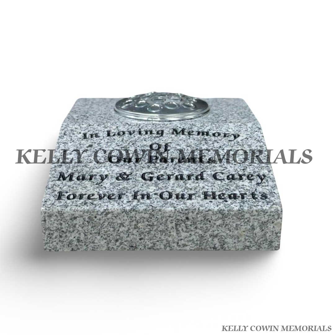 face view Grey granite sloped memorial grave vase with silver flower holder lid and personalised black engraved inscription.