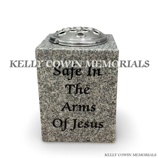Front view of grey granite square vase with silver lid and black inscription